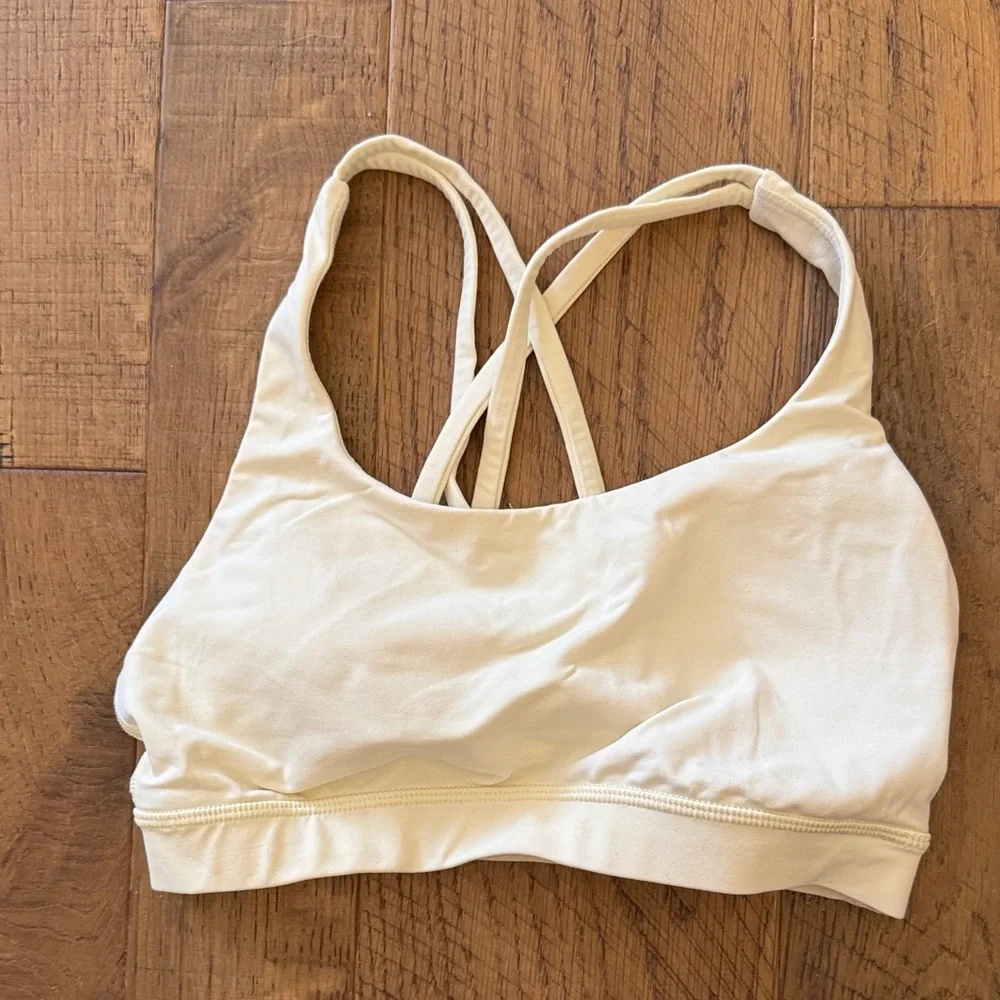 Lululemon sports bra in cream /yellow SIZE UNKNOWN seems to be able a 2 or 4 - Picture 1 of 2